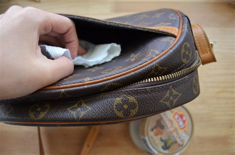 how to clean louis vuitton bag inside suede|does louis vuitton clean bags.